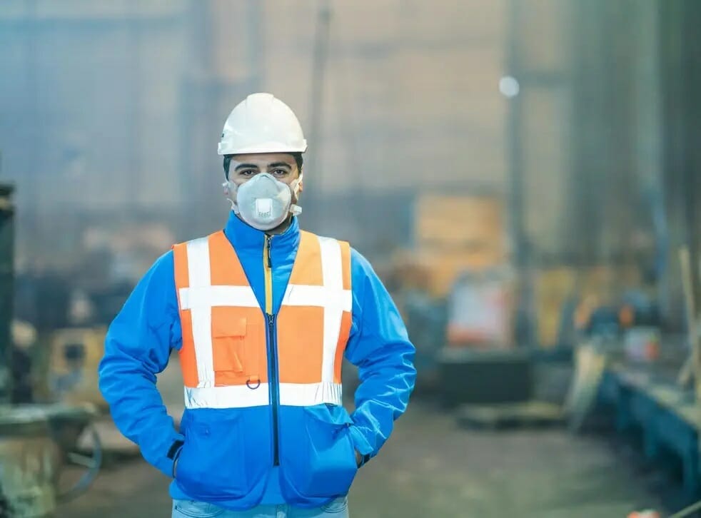 civil engineer wearing PPE at construction site