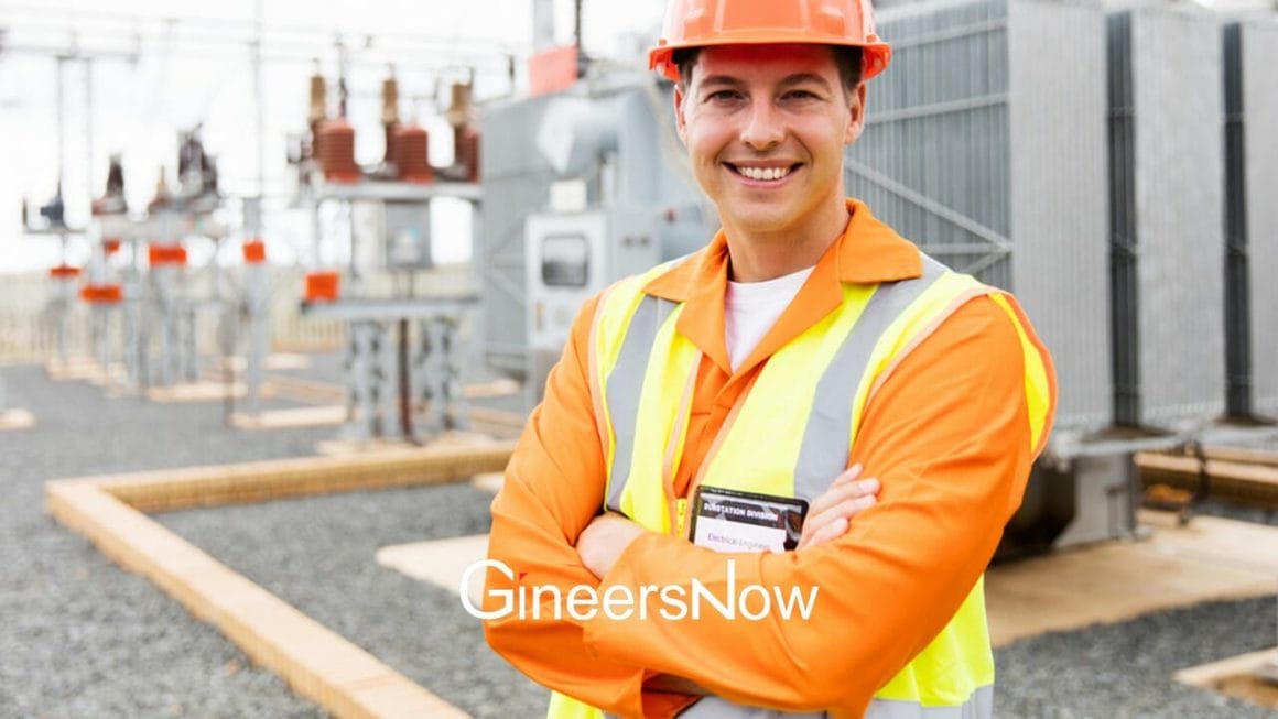 Electrical engineer smiling at a power plant because he read the complete list of job board websites article