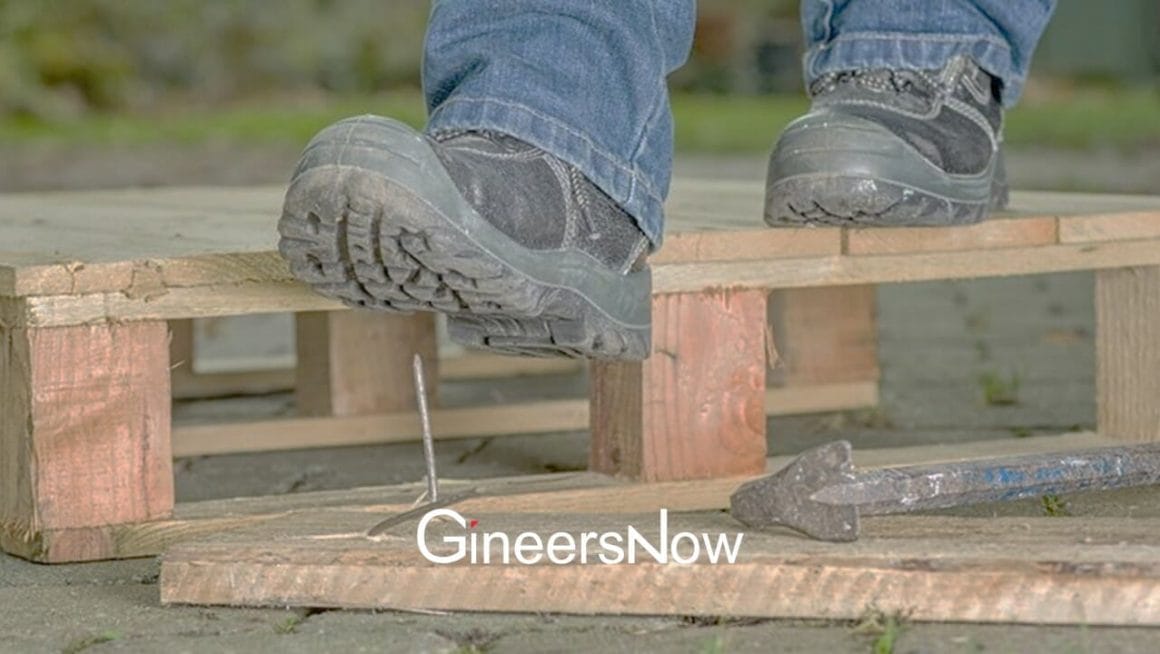 safety shoes and nail at construction site