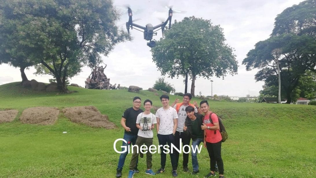 Geodetic Engineering students from UP Diliman flying a drone 